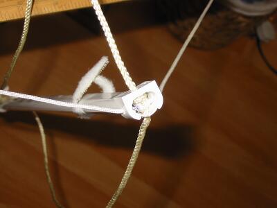 end fixing for strings on flexible conduit