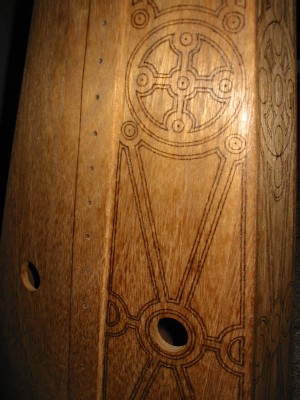 Wire-strung harp pokerwork